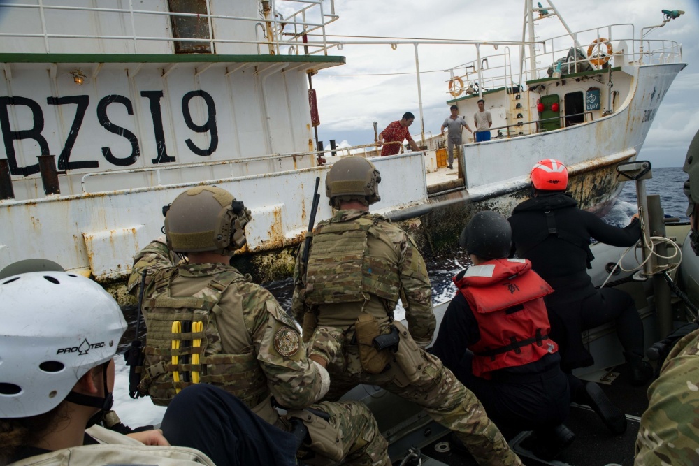 Members of a combined Navy-LEDET boarding team approach a Chinese fishing vessel during the 2016 Oceania Maritime Security Initiative (OMSI) in the Pacific. (U.S. Navy) Members of a combined Navy-LEDET boarding team approach a Chinese fishing vessel during the 2016 Oceania Maritime Security Initiative (OMSI) in the Pacific. (U.S. Navy)